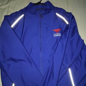 A blue windbreaker It’s a SMU zip up